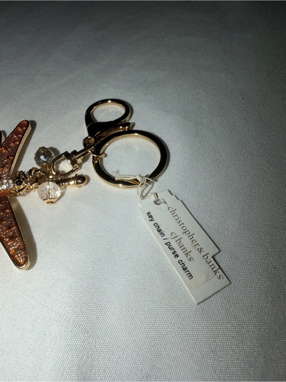 Christopher & Banks Gold Dragonfly Keychain with Purple and Gold Tone Wings